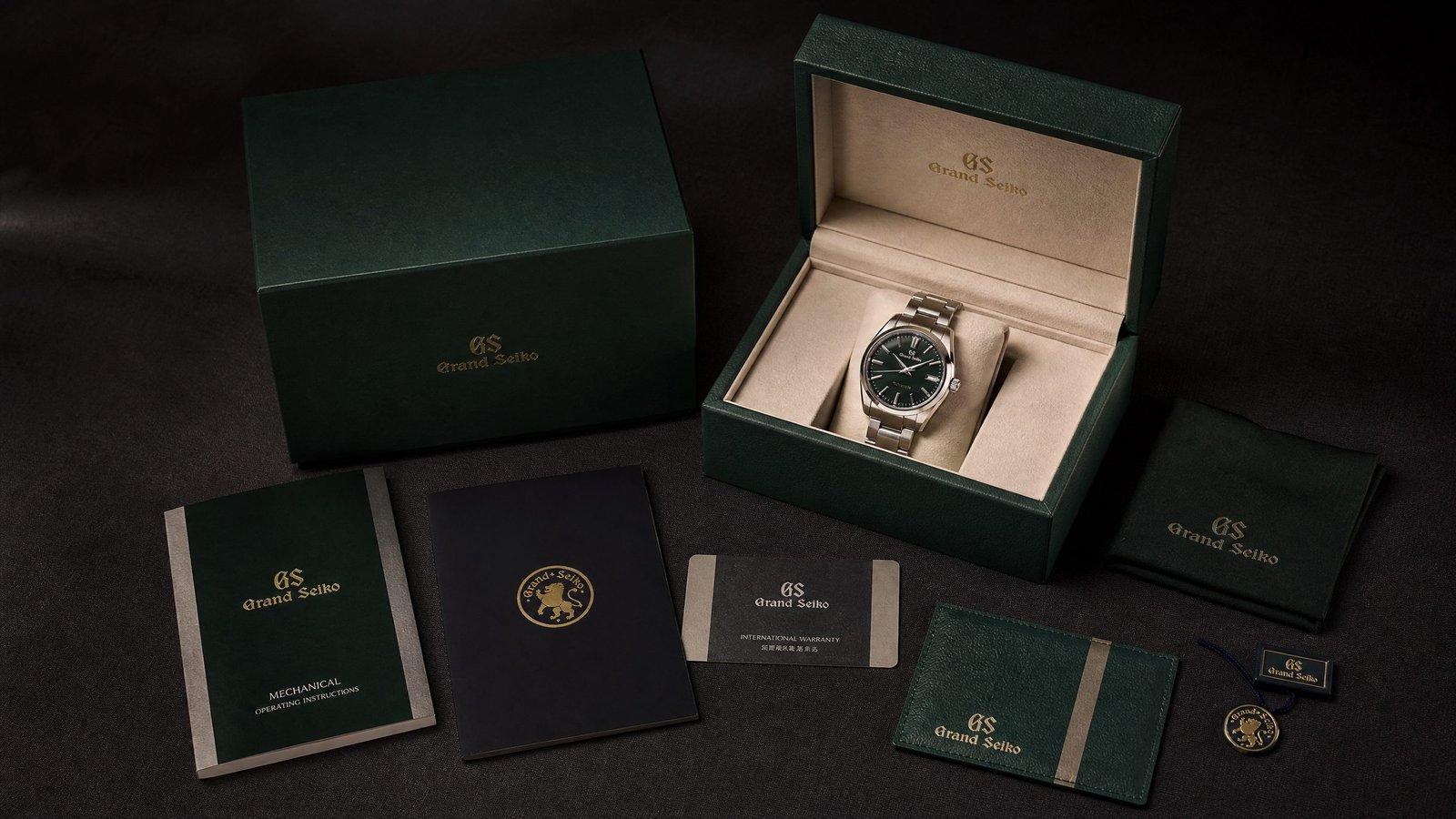 Complete luxury watch set with presentation box, warranty card and papers